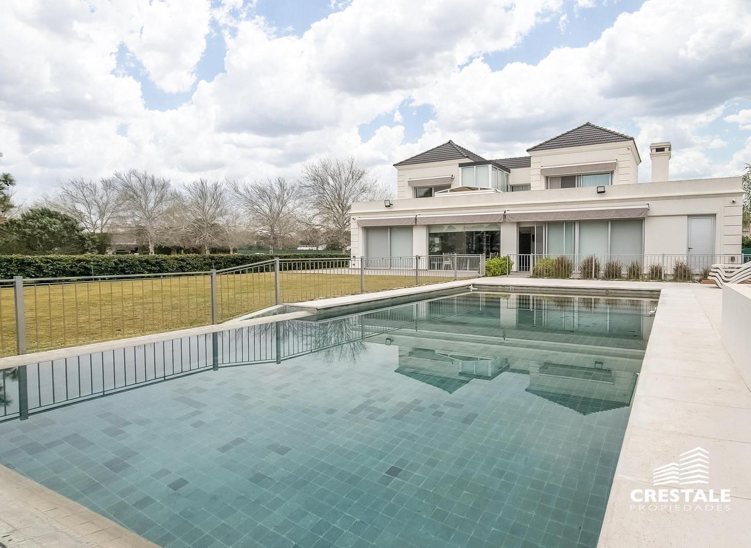 Foto de Venta / Permuta - Casa 4 dormitorios con vista a la cancha de golf, imagen 2