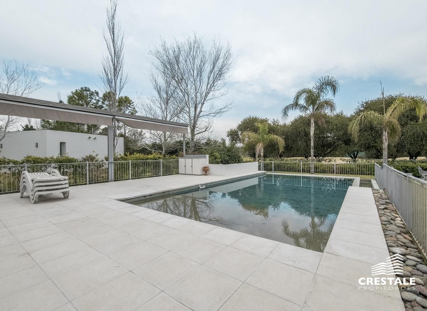 Foto de Venta / Permuta - Casa 4 dormitorios con vista a la cancha de golf, imagen 5