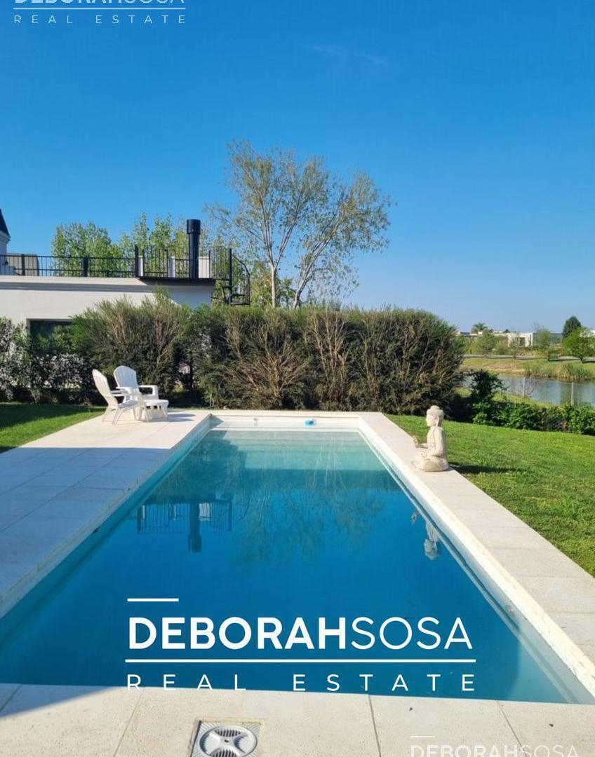 Foto de Casa en Venta Una Planta con espejo de agua - 4 amb El Cantón - Belén, imagen 1