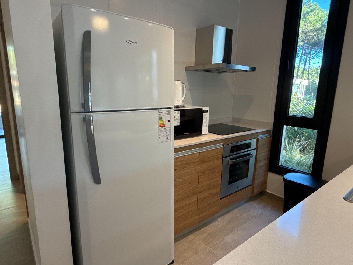 Foto de VENTA DEPARTAMENTO 3 AMBIENTES CON JARDÍN PINAMAR, imagen 2