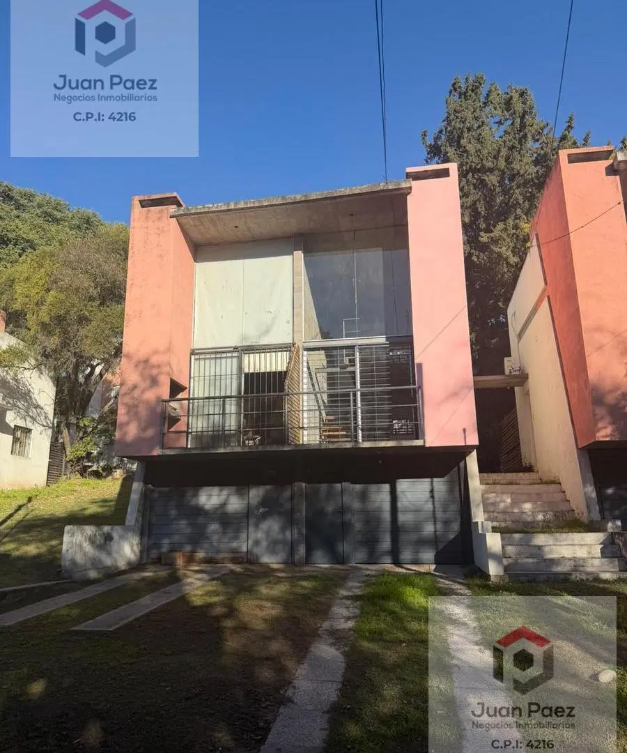 TRIPLEX CON COCHERA Y ASADOR 8