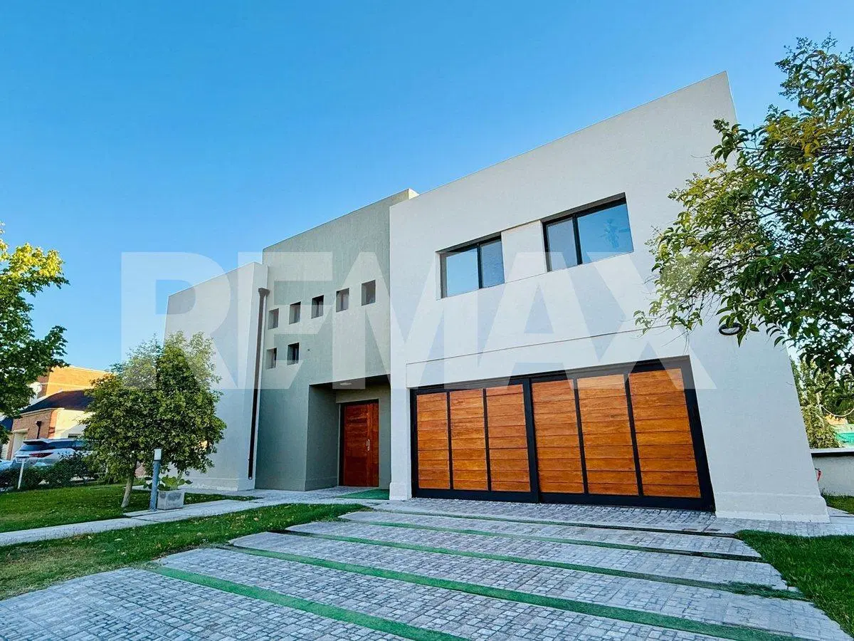 VENTA CASA 4 DORMITORIOS, B° COMAHUE GOLF CLUB 8
