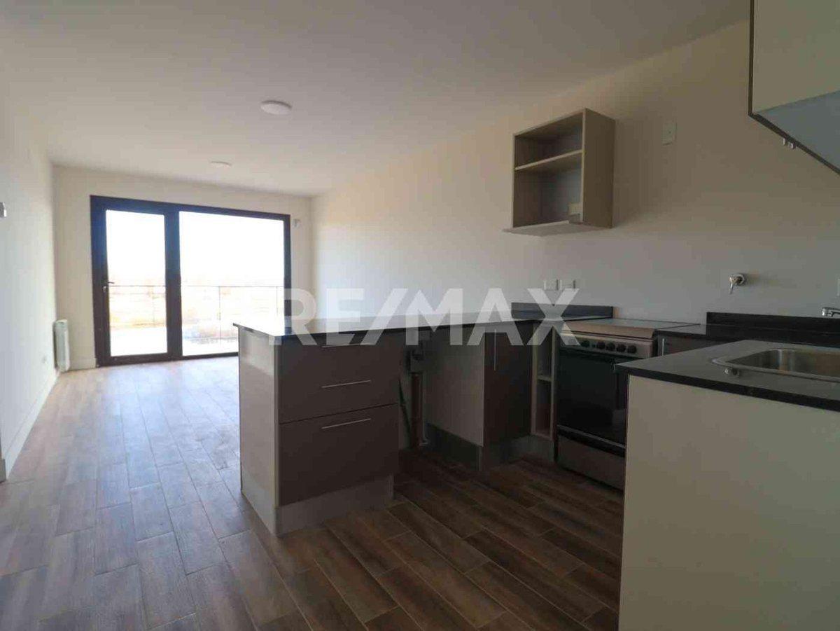 Foto de VENTA DEPARTAMENTO 1 DORM PLANTA BAJA , B° CANALES, imagen 3