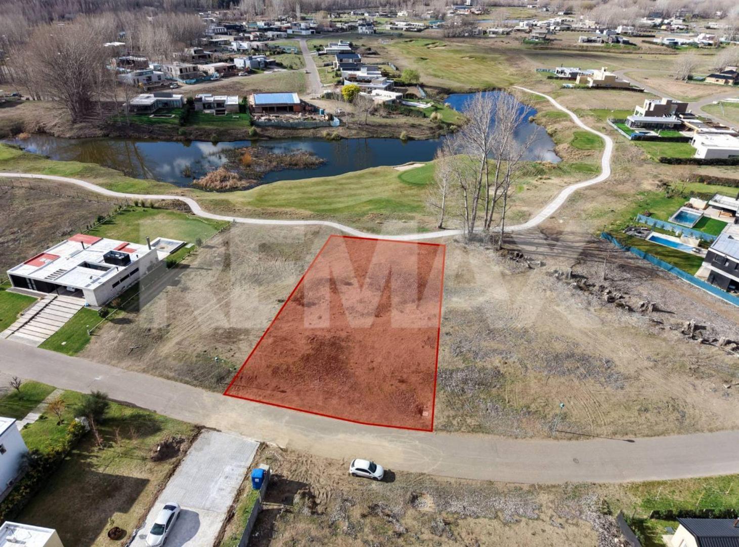 Foto de LOTE EN BARRIO LOS CANALES DE PLOTTIER, imagen 1