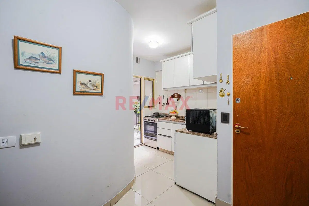 DEPARTAMENTO 4 AMBIENTES CON COCHERA A LA VENTA 2