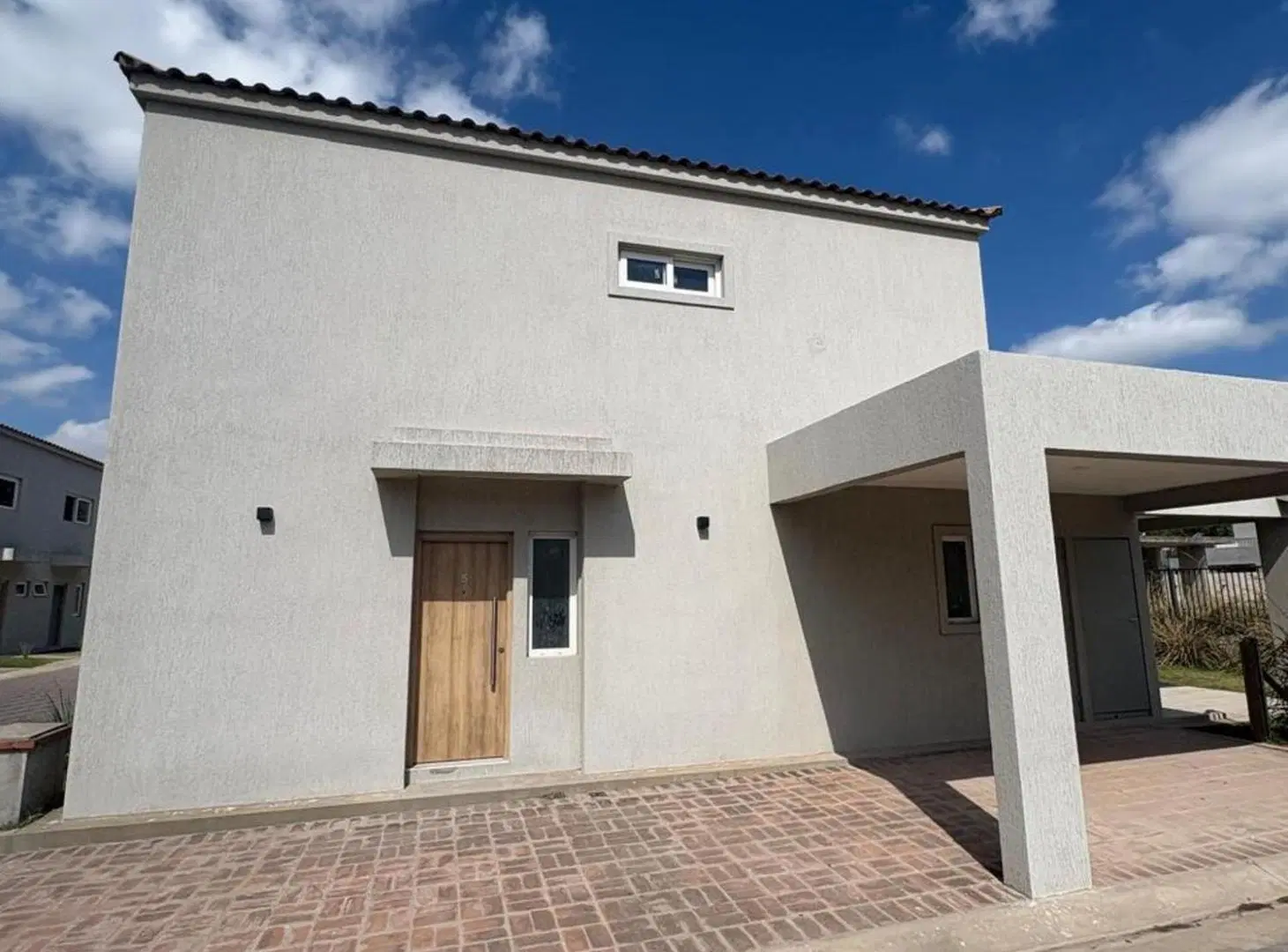 Venta casa 3 ambientes Chic Village jardin terraza 2