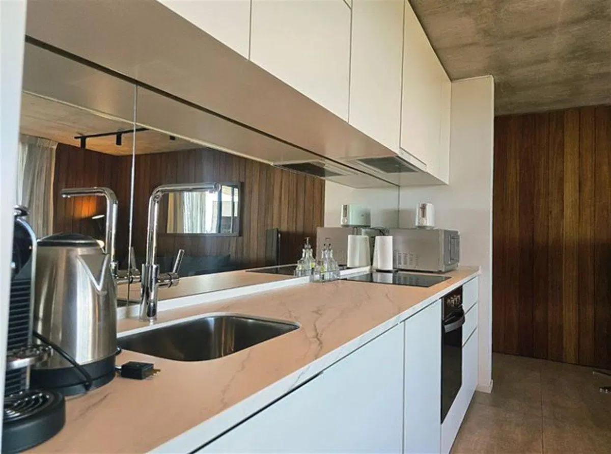 SEMIPISO EN VENTA EN MANANTIALES,2 DOR/2 BAÑOS 4