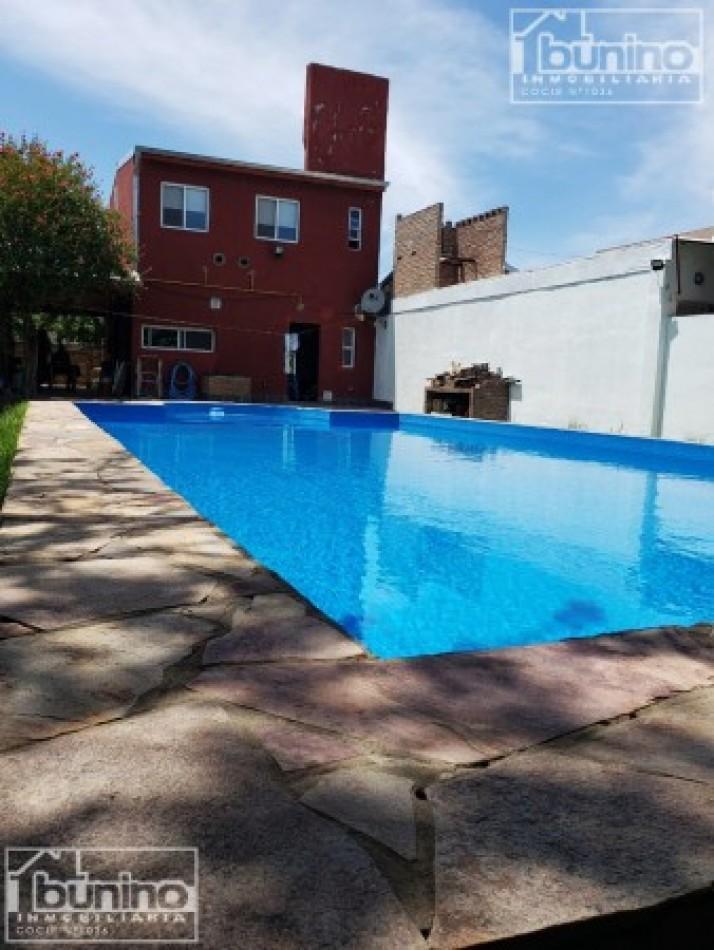 Foto de Casa alquiler temporario en Funes - 3 habitaciones con piscina, imagen 1