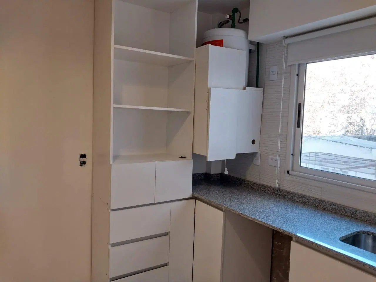 Departamento monoambiente con cochera fija cubierta! 5