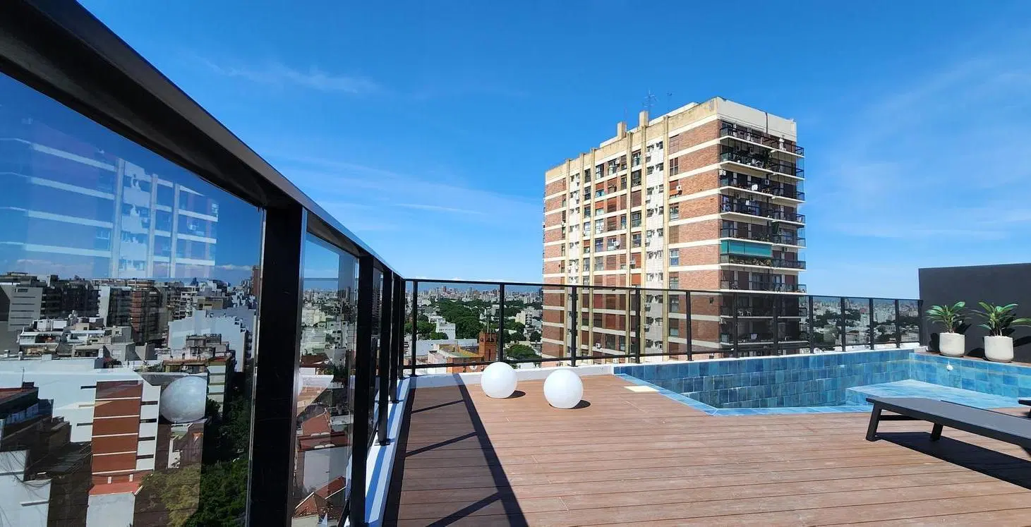 Un ambientes con balcon y parrilla !! 4