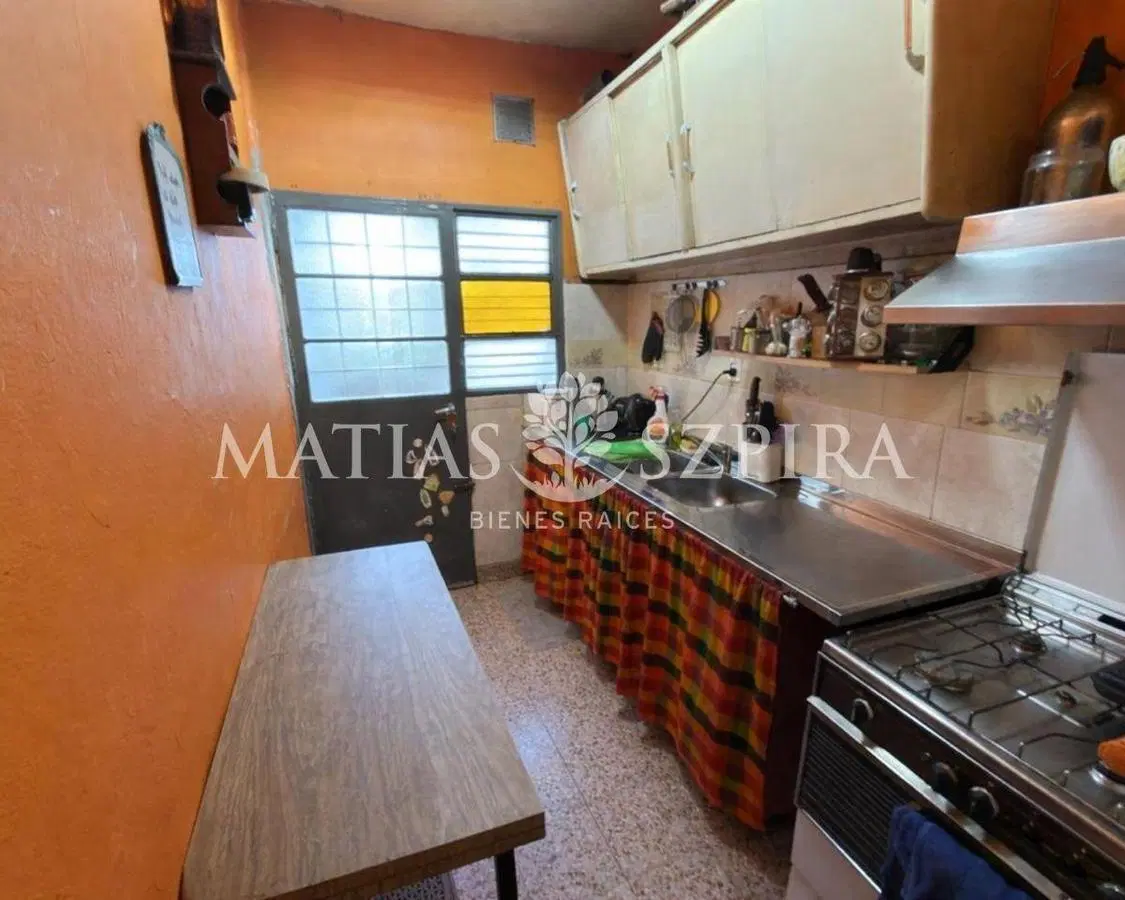 CASA EN VENTA 4 AMBIENTES CON COCHERA EN ITUZAINGO 3