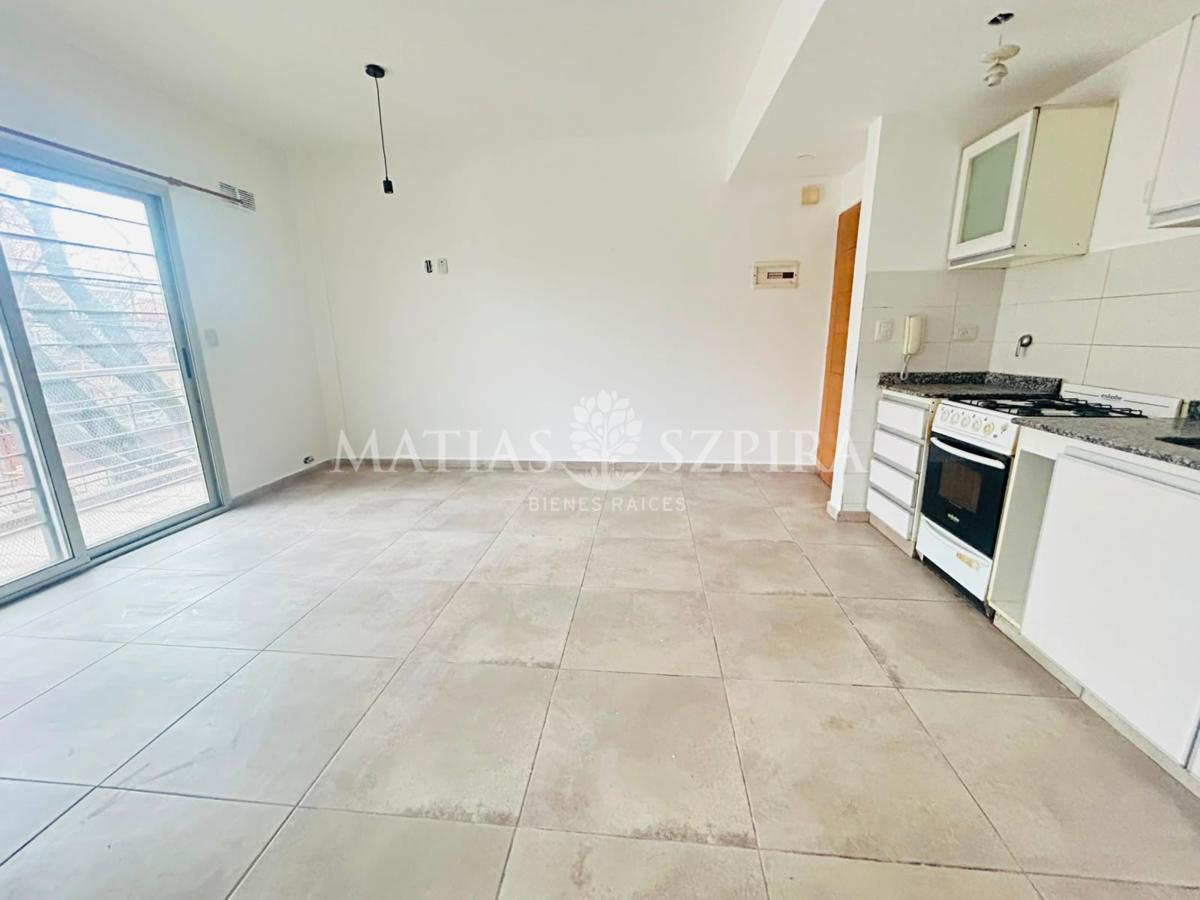Foto de VENTA DEPARTAMENTO CON BALCON Y COCHERA MERLO CENTRO, imagen 2