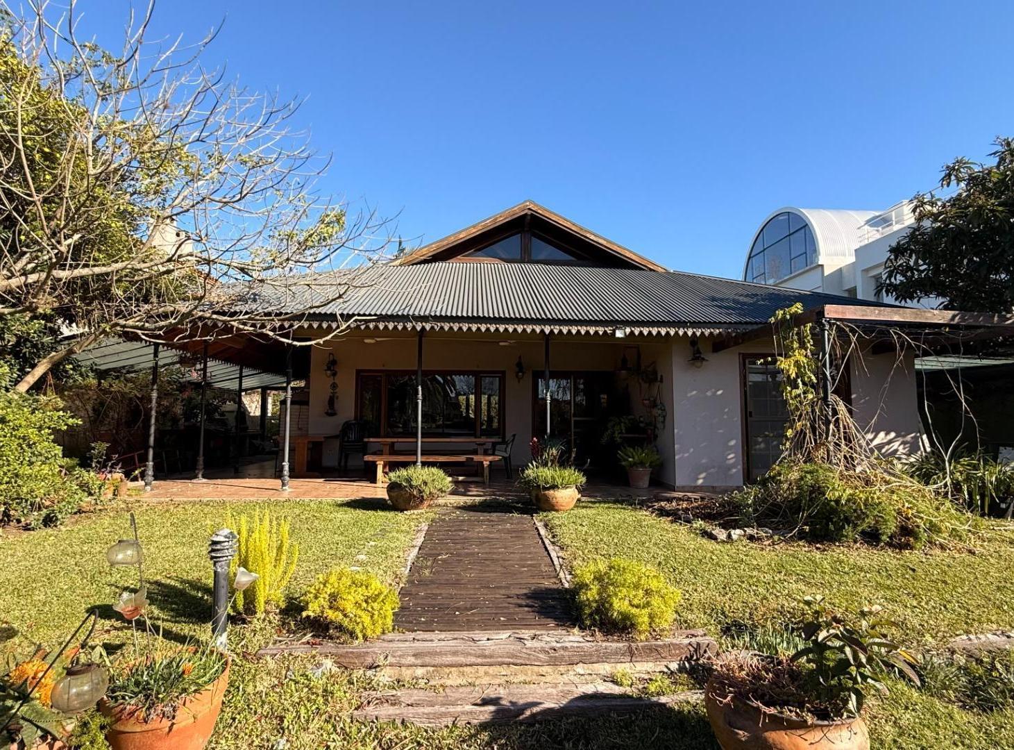 Foto de Casa en una sola planta a la laguna en venta, B. Los Ombúes, imagen 2