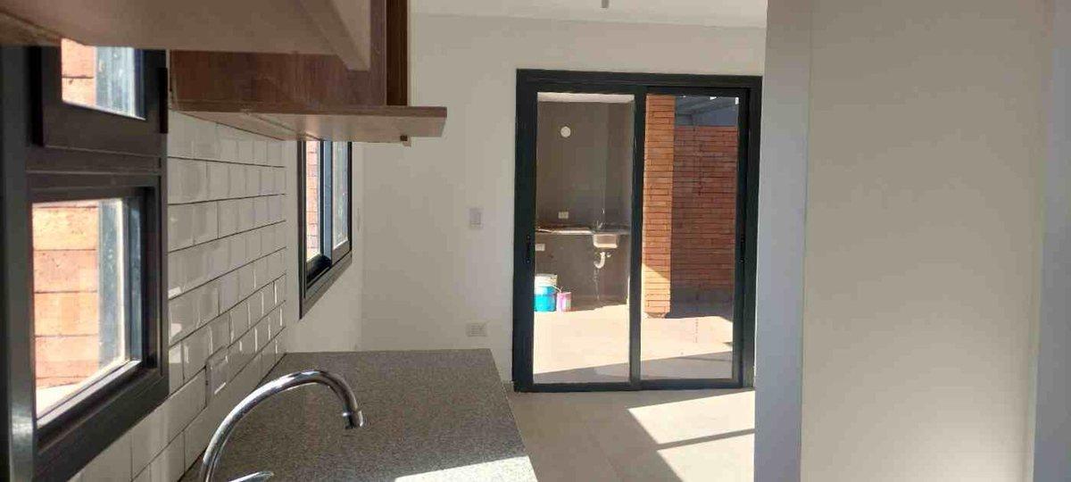 Foto de VENTA DUPLEX 3 DORMITORIOS, HOUSING DISTRITO BUNGE, imagen 1