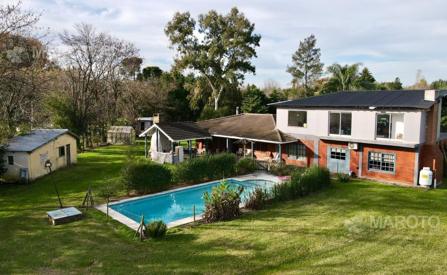Foto de Casa en venta, amplio lote con piscina y parrilla, imagen 2