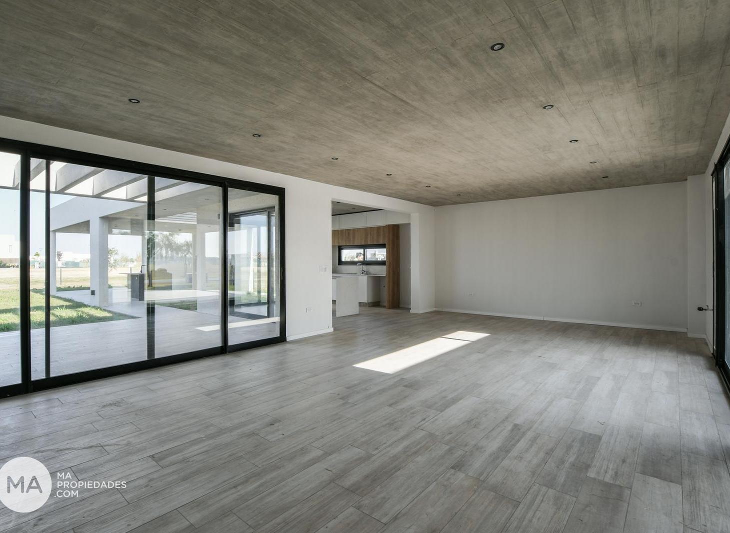 Foto de Casa 3 Dormitorios con jardín y galería - Vida Club de Campo - Funes |, imagen 2