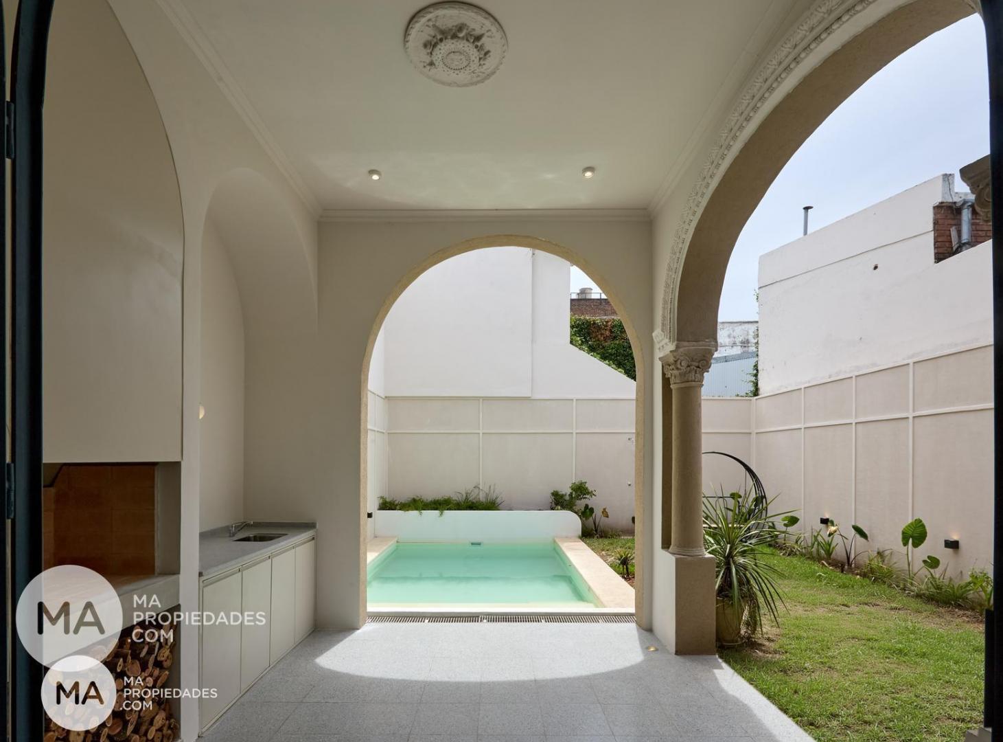 Foto de Casa de diseño con cochera, jardín y terraza - Sarmiento al 2000, imagen 3