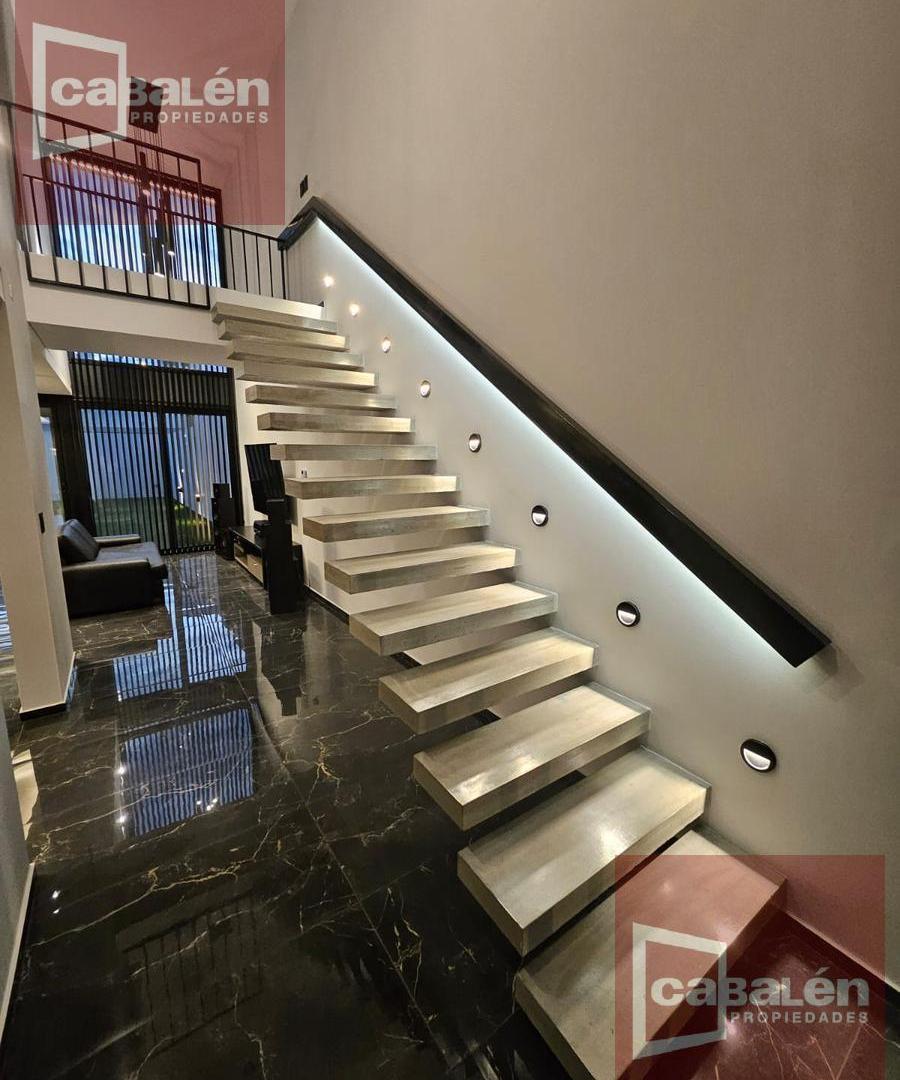Foto de La Calandria. Duplex de 3 dormitorios, escritorio,3 baños, cochera doble, asador, imagen 3