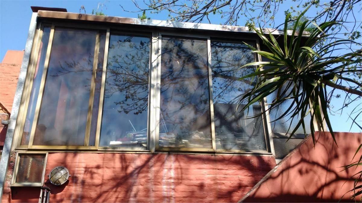 CHALET 4 AMBIENTES CON QUINCHO COCHERAS JARDIN