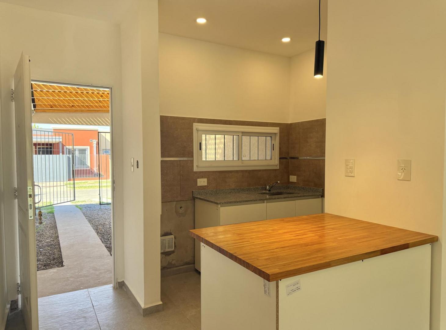 Foto de departamento Duplex a estrenar en venta 3 ambientes con patio y cochera, imagen 2