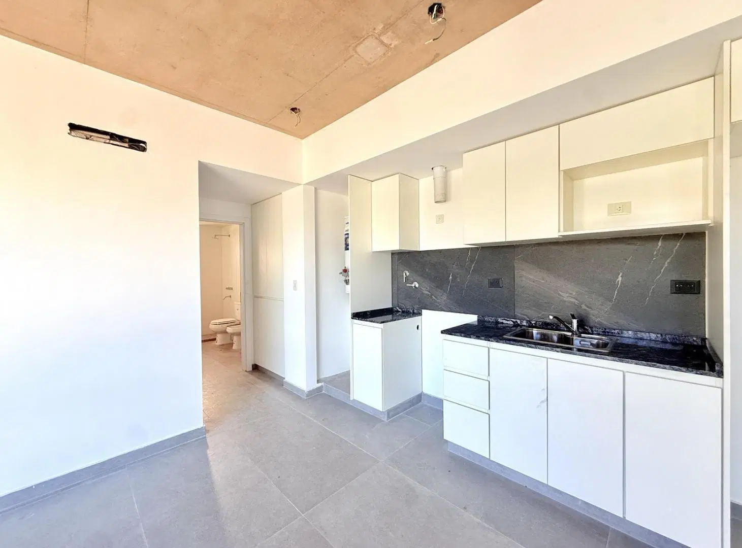 Departamento a estrenar 2 ambientes en venta en lujan centro con cochera 4