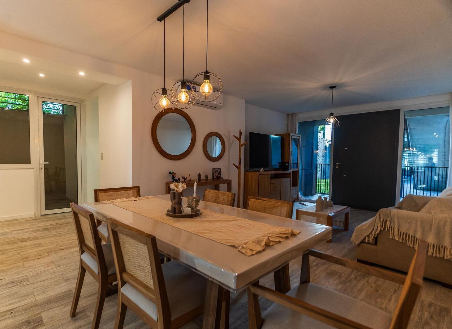 Foto de departamento tres ambientes planta baja con patio y cochera en venta en, imagen 1