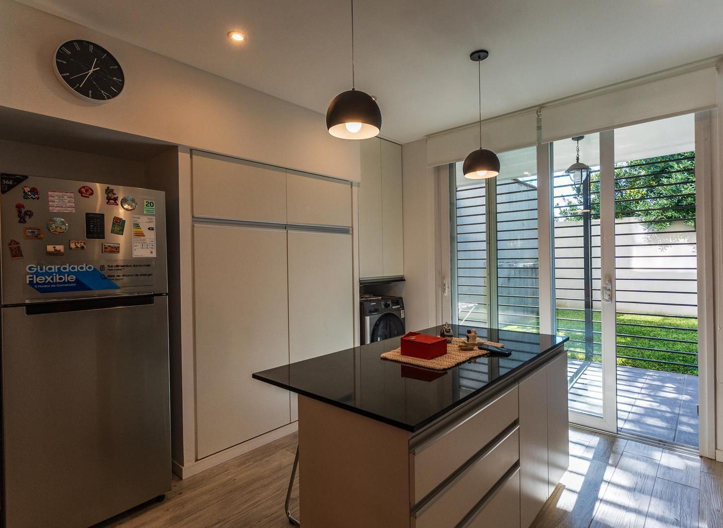 Foto de departamento tres ambientes planta baja con patio y cochera en venta en, imagen 3
