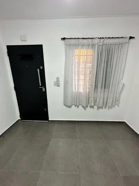 DEPARTAMENTO DOS AMBIENTES CON COCHERA 3