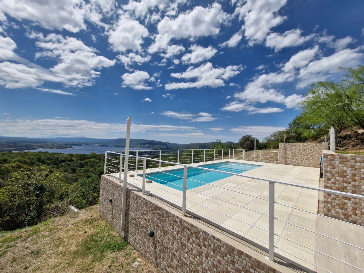 Hermoso depto en barrio privado con piscina Climatizada y vista al lago
