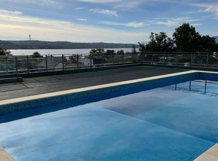 VENTA DEPTO 1 DOR. CARLOS PAZ SANTA RITA COCHERA P 4