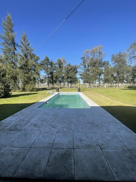 Foto de MODERNA CASA EN VENTA, CLUB DE CAMPO EL MORO, MARCOS PAZ, imagen 2