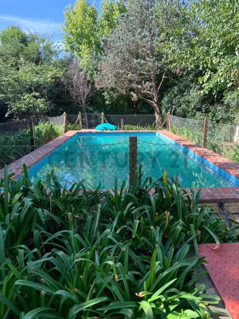 CASA DOS DORMITORIOS EN VENTA VILLA ELISA C/PILETA 5