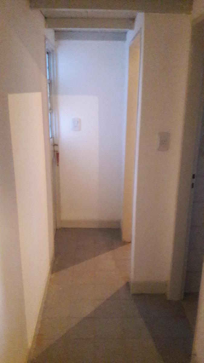 Galpón con Vivienda Multifamiliar.
