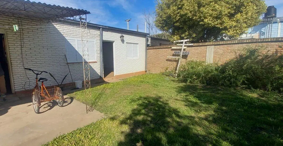 VENTA CASA 3 DORMITORIOS y AMPLIO PATIO VERDE 5