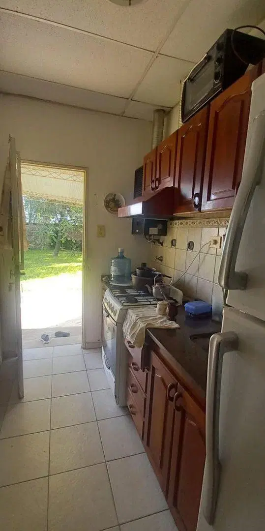 VENTA CASA 3 DORMITORIOS y AMPLIO PATIO VERDE 5