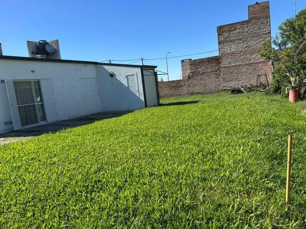 VENTA CASA 2 DORMITORIOS PUJATO NORTE(LADO COMUNA) 3