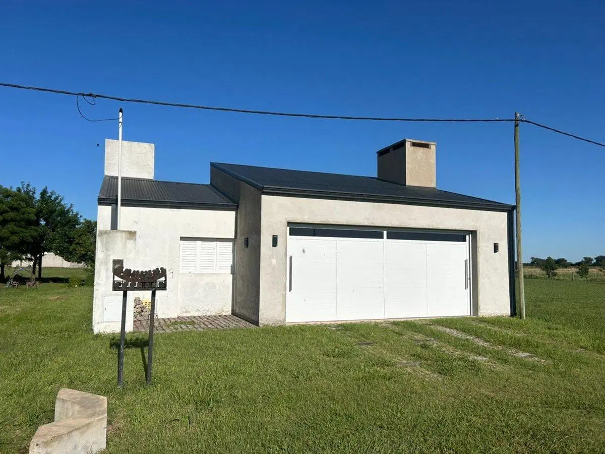 VENTA CASA 2 DORMITORIOS PUJATO NORTE(LADO COMUNA) 2