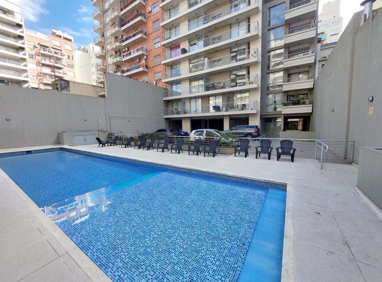 Foto de Departamento de 2 ambientes con balcón corrido y cochera en edificio, imagen 3
