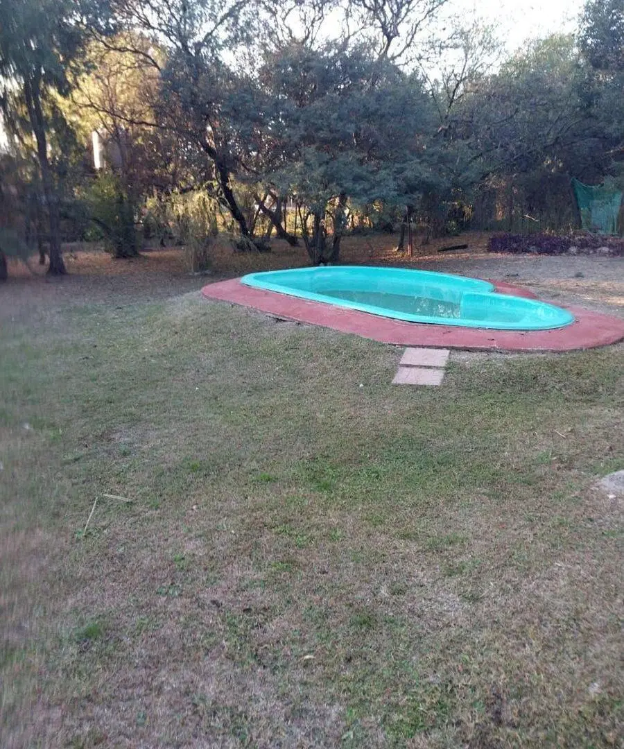 VENTA TRES CASAS CON PILETA  LA GRANJA CORDOBA 2