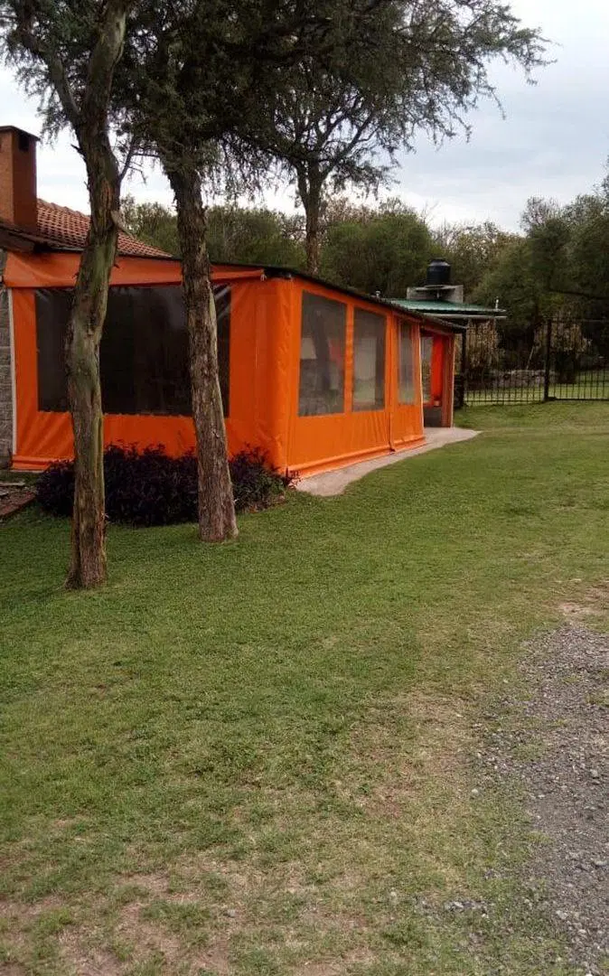 VENTA TRES CASAS CON PILETA  LA GRANJA CORDOBA 5