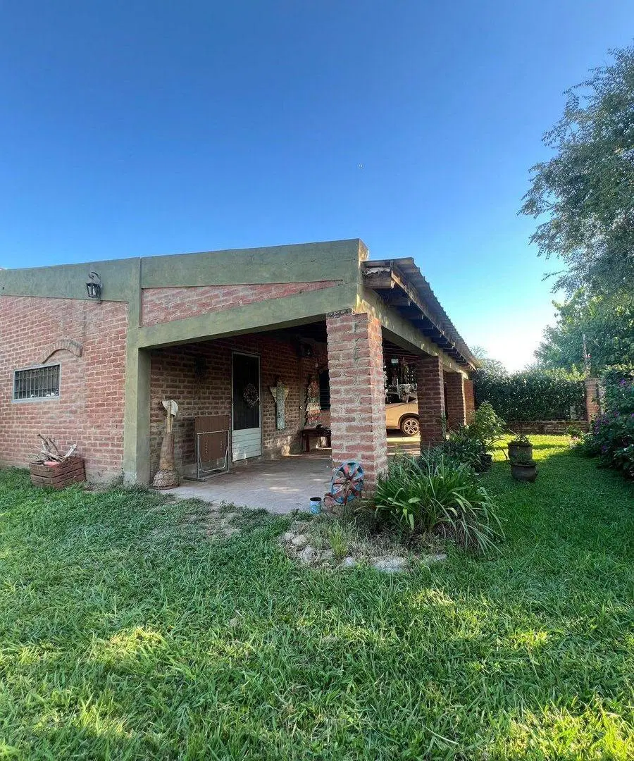 VENTA DE CASA 5 DORMITORIOS A METROS DEL RIO 4