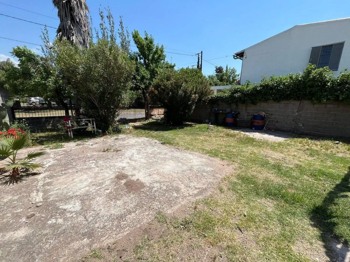 VENTA CASA CON DEPTO FRENTE A JARDIN BOTANICO 2