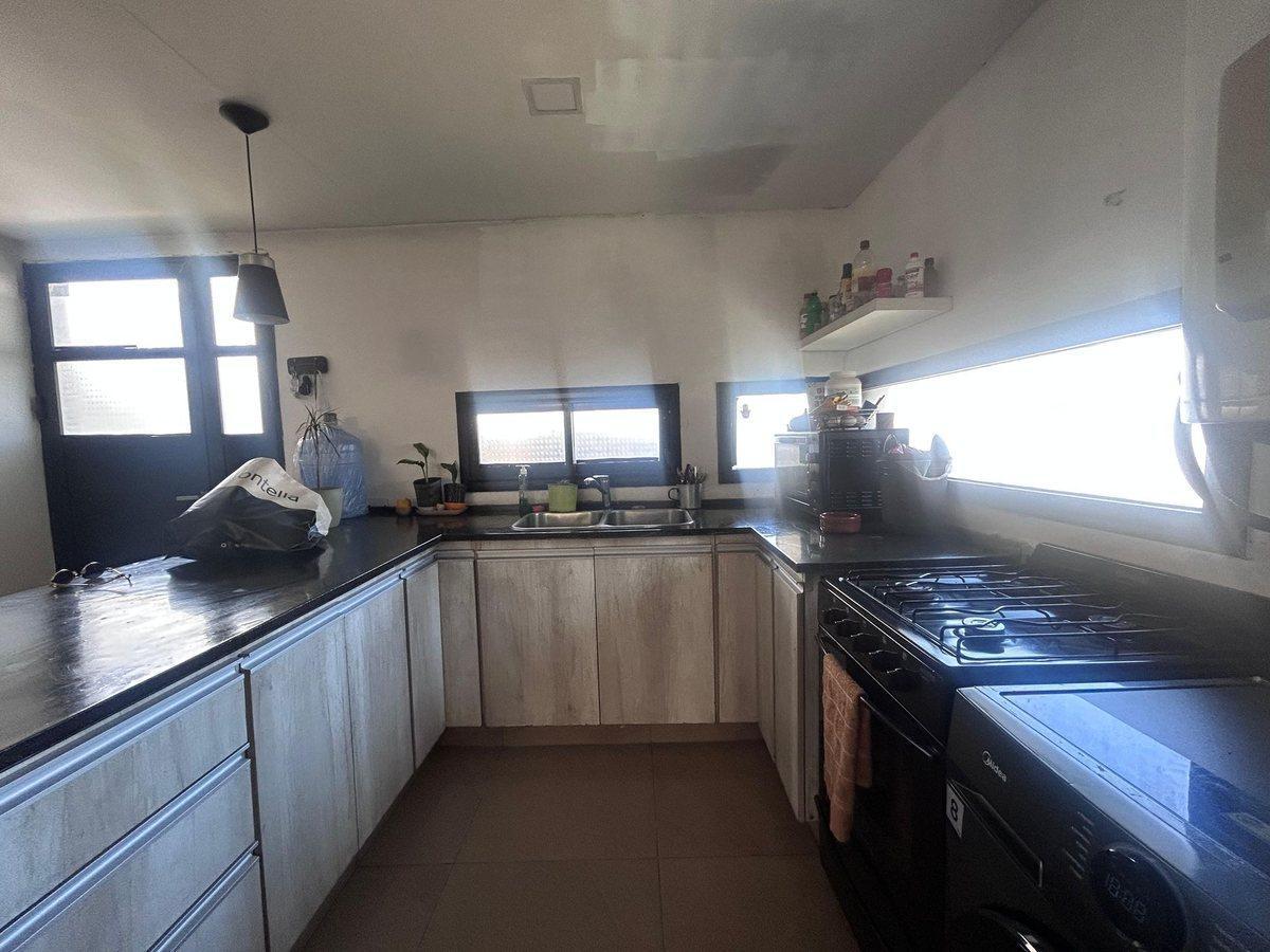Foto de VENTA CASA 2 DORM EN BARRIO SPILIMBERGO NORTE CBA, imagen 1