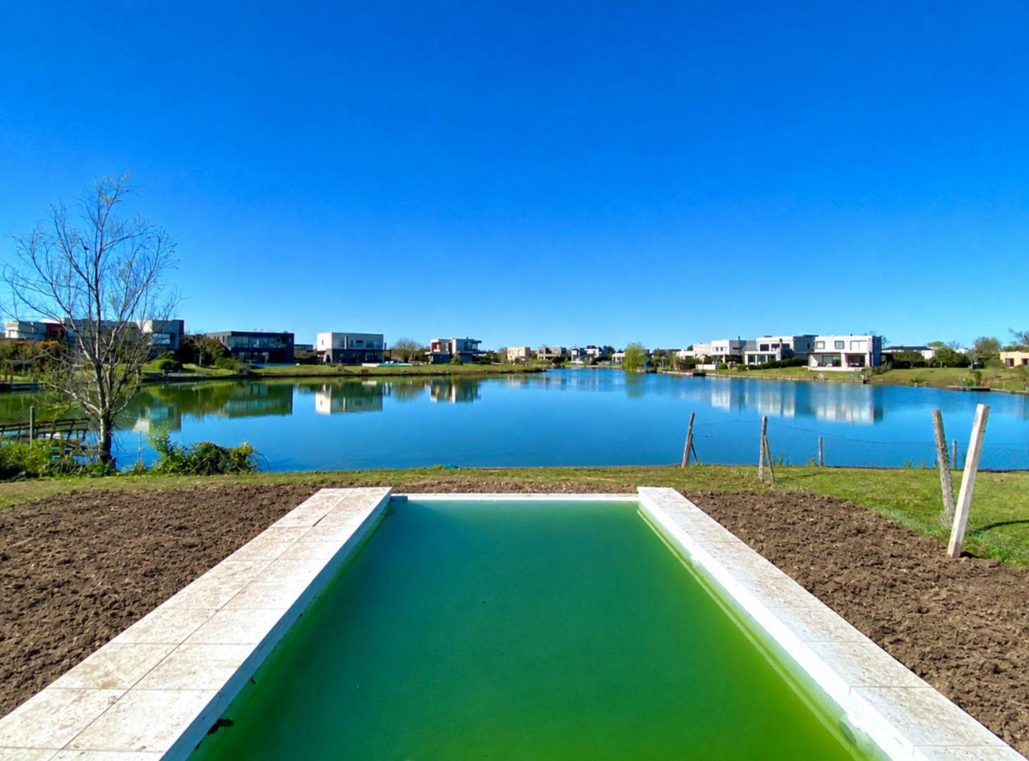 Foto de Venta Casa Estrenar a la Laguna con Pileta Cantón, imagen 4