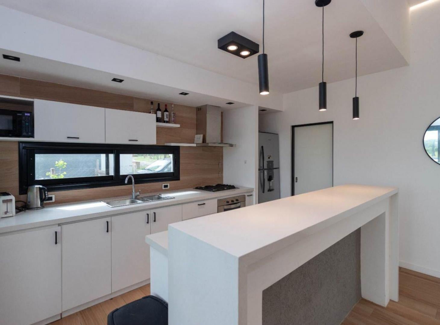 Foto de CASA 4 AMB. DESARROLLADA EN PLANTA BAJA C/ PISCINA, imagen 3
