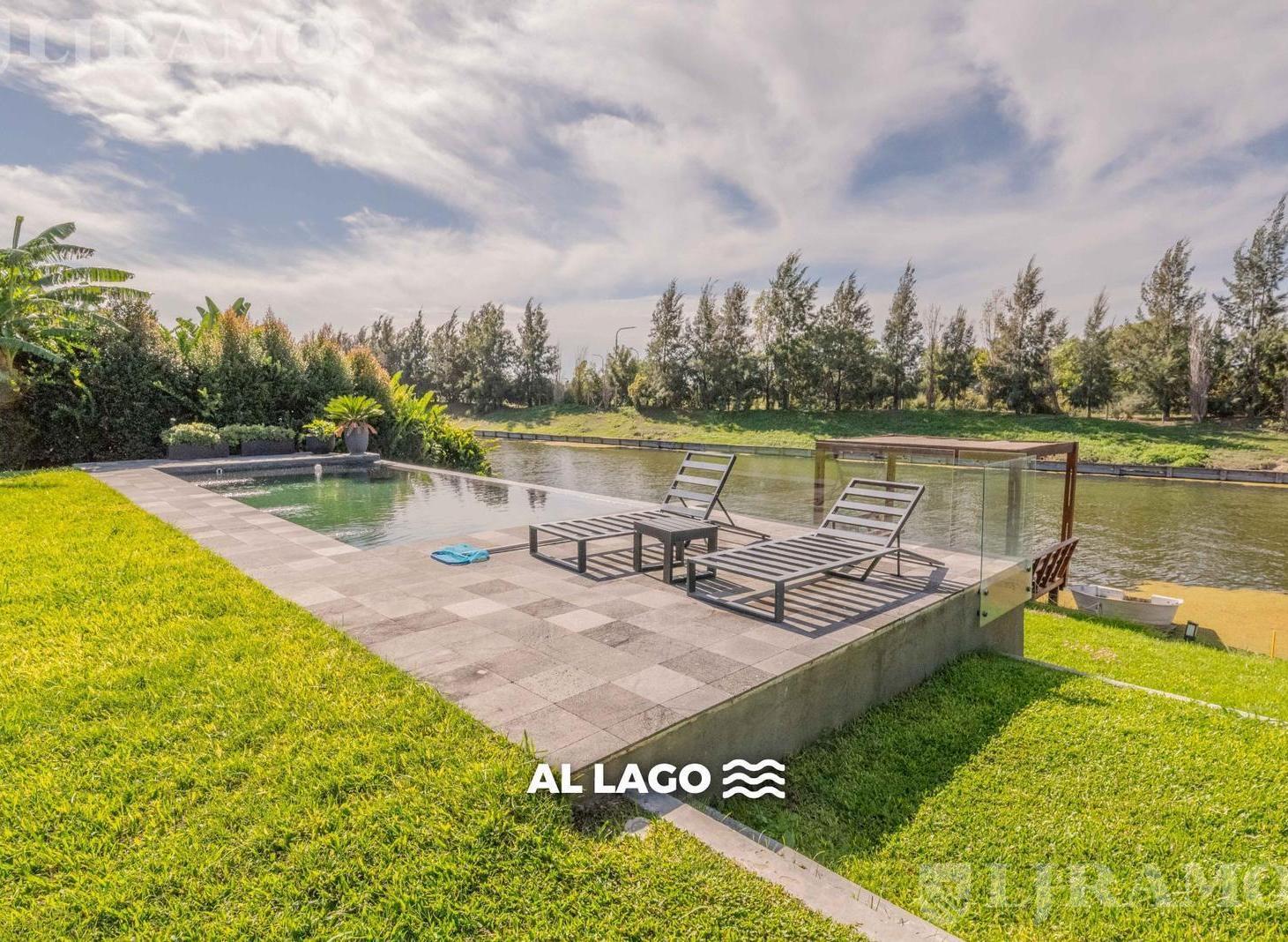 A laguna con 4 dormitorios en venta casa en Virazón - Nordelta.