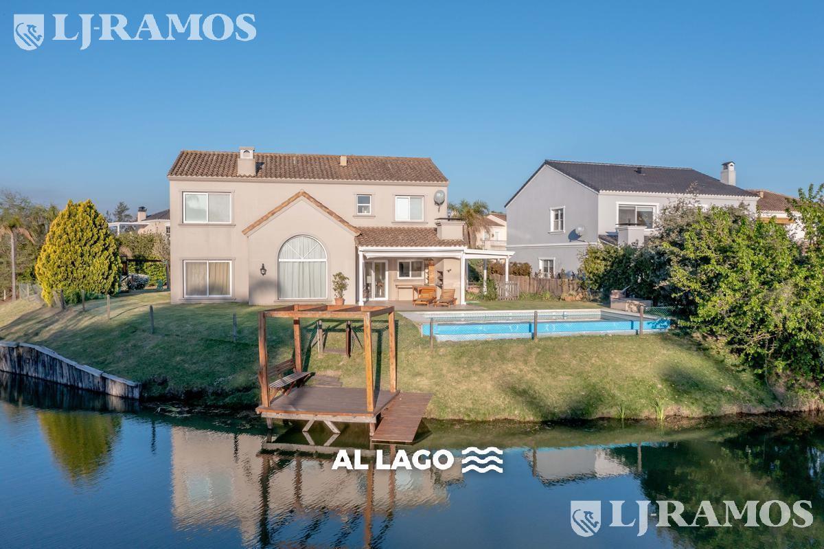 Casa a la laguna con 4 dormitorios en venta y/o alquiler en Barrancas del Lago.
