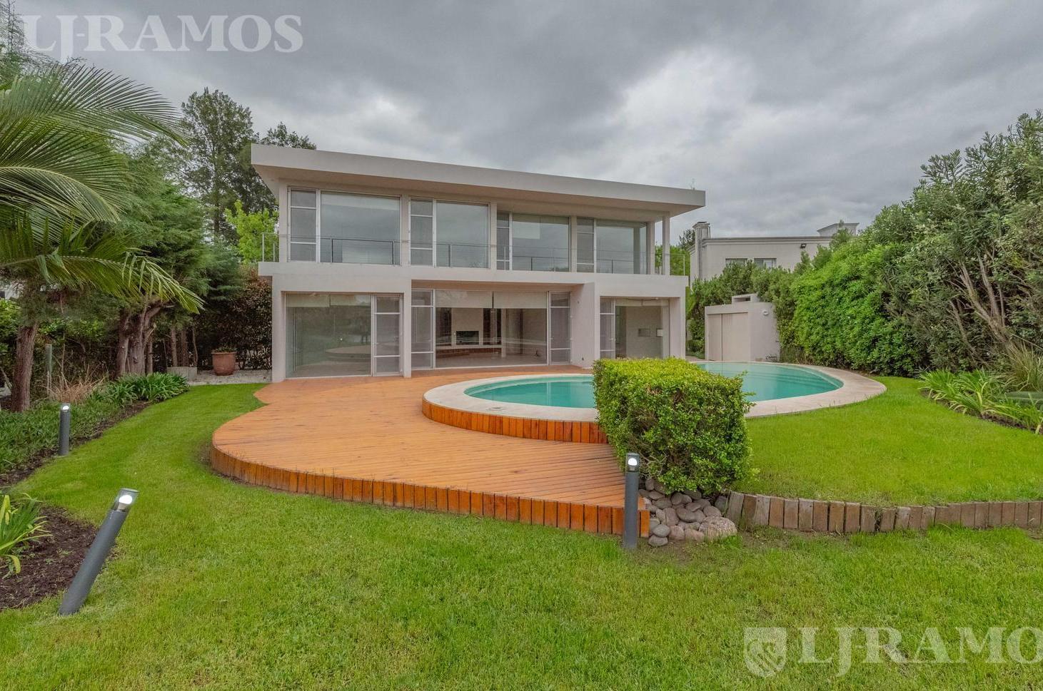Foto de Casa a la laguna con 4 dormitorios en venta en LOS OMBÚES, imagen 2