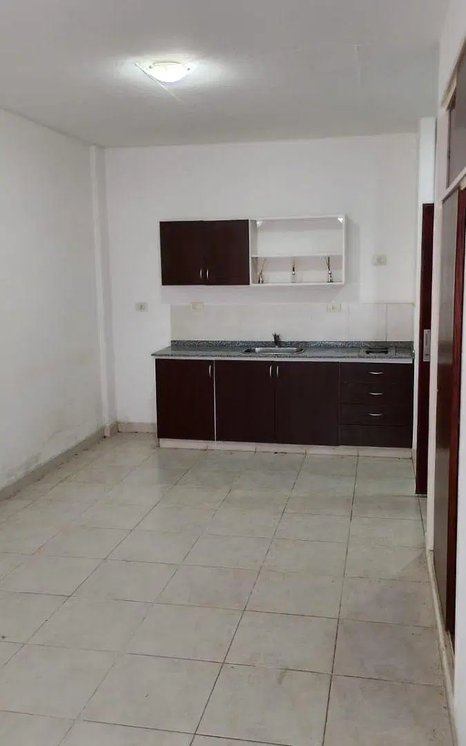 EDIFICIO EN CUATRO PLANTAS EN EXCELENTE UBICACION 12 UNIDADES MONOAMBIENTE Y 4 UNIDADES EN DUPLEX 1