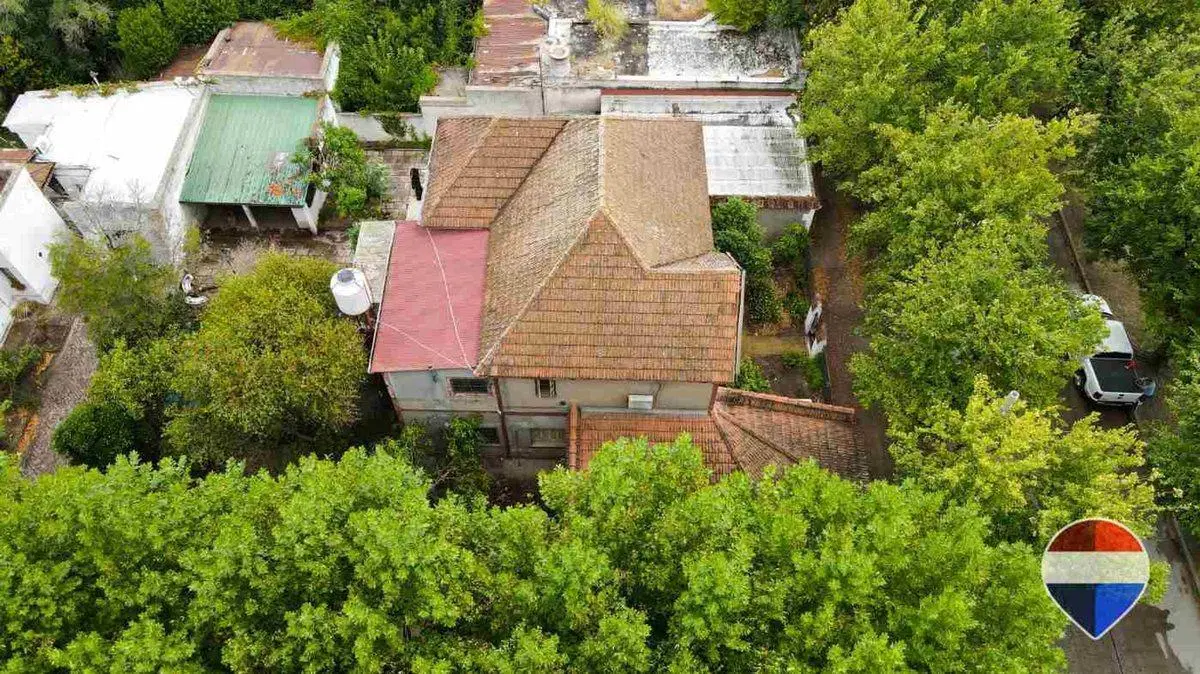 CASA y  3 LOCALES SOBRE 3 TERRENOS  EN LAS HERAS 5